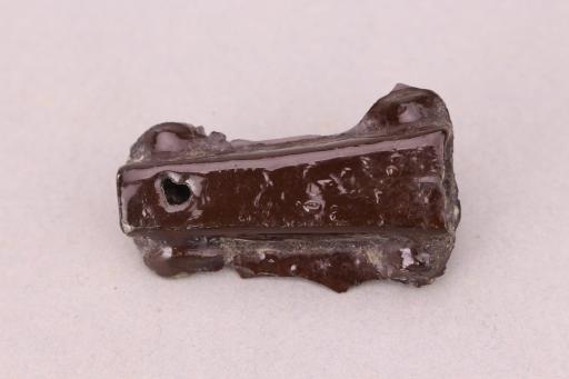 战国时期髹黑漆铜盾牌饰