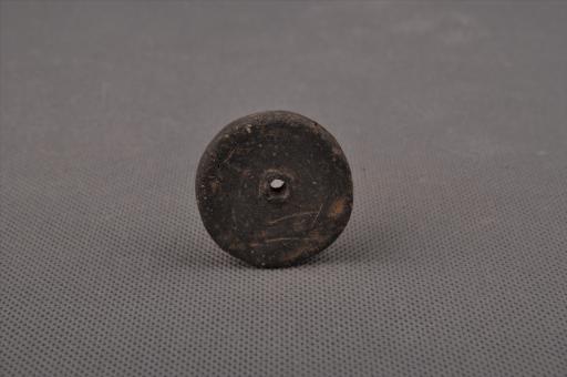 新石器时代屈家岭文化圆饼形中穿夹砂褐陶纺轮