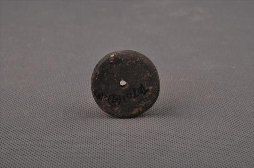 新石器时代屈家岭文化圆饼形中穿夹砂褐陶纺轮