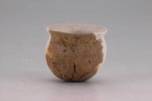 新石器时代城背溪文化鼓腹圜底绳纹夹砂褐陶釜