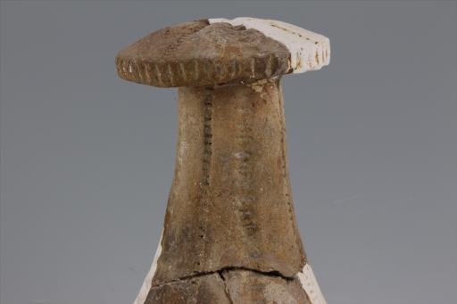 新石器时代大溪文化弧顶戳印指压纹红陶支座