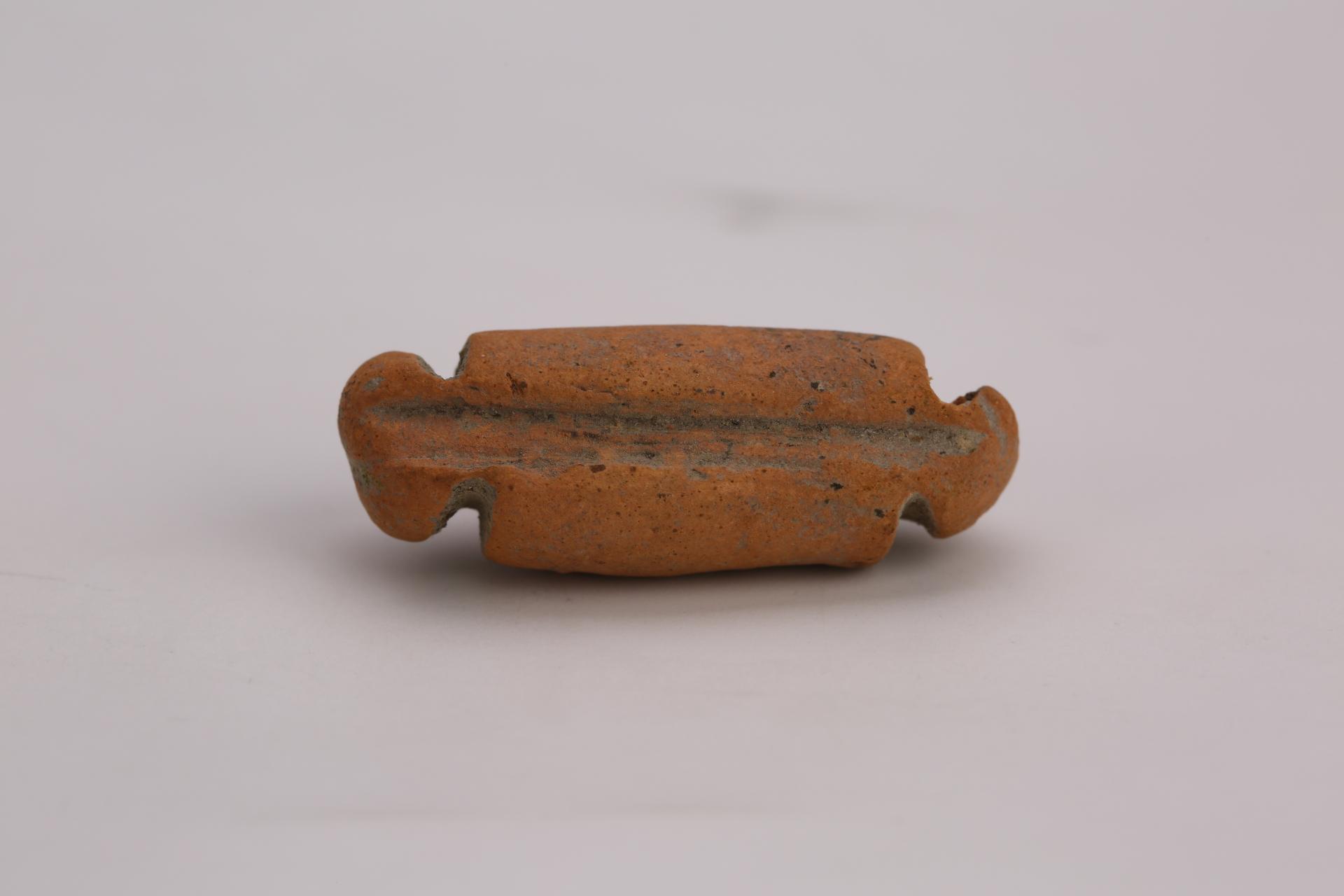 周长条形泥质红陶网坠