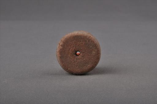 新石器时代大溪文化圆饼形泥质红褐陶纺轮