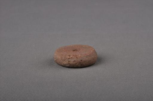 新石器时代大溪文化圆饼形泥质红褐陶纺轮