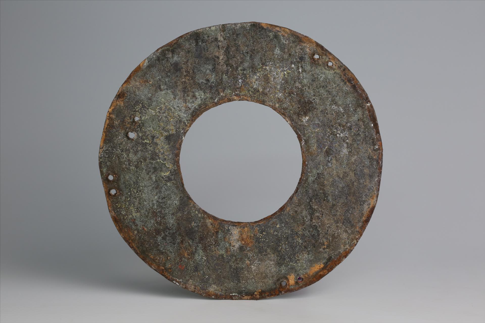 春秋时期八孔璧形锡饰片