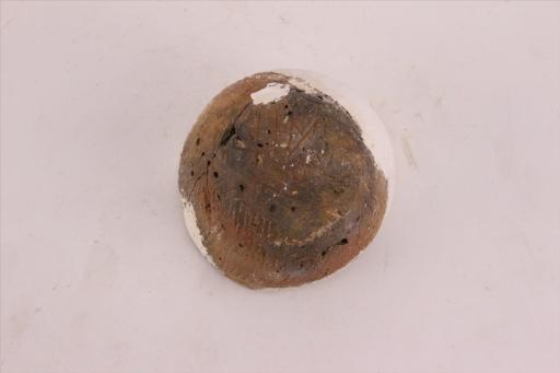 新石器时代城背溪文化侈口弧腹平底绳纹夹砂红褐陶钵
