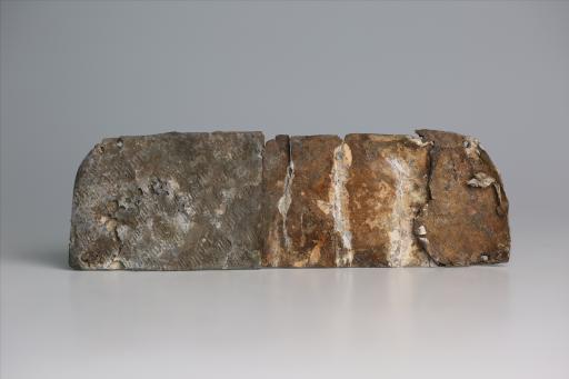 春秋时期长条梳形綯纹锡饰片