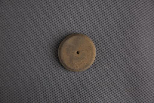 新石器时代屈家岭文化圆饼形中穿夹砂黄褐陶纺轮