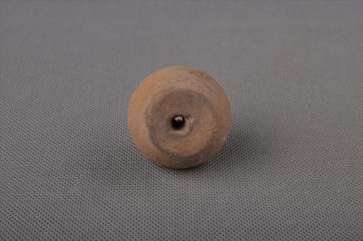 新石器时代大溪文化圆台形中穿夹细砂黄褐陶纺轮