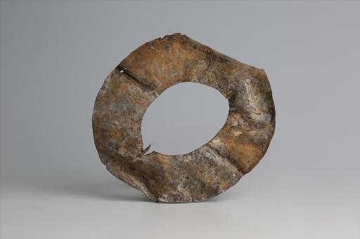 春秋时期四孔璧形锡饰片