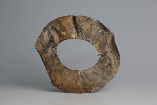 春秋时期四孔璧形锡饰片