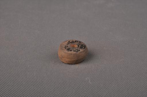 新石器时代屈家岭文化算珠形中穿夹细砂黄褐陶纺轮