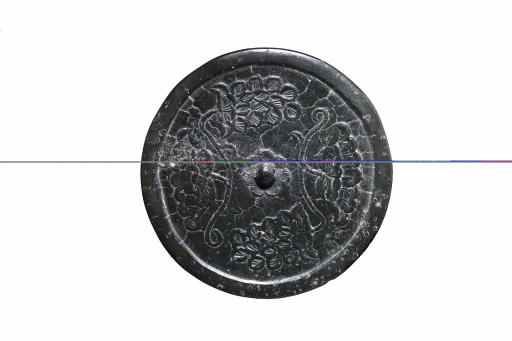 宋圆钮花卉纹铜镜