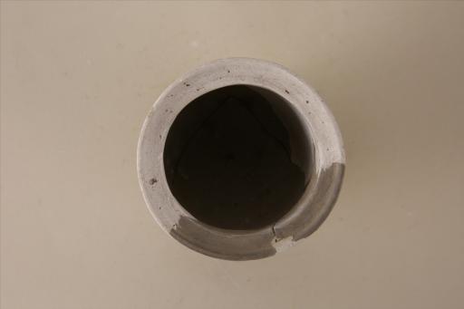 新石器时代屈家岭文化内凹仰折沿折腹喇叭形高圈足夹砂灰陶杯