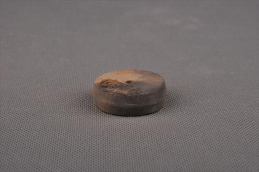 新石器时代屈家岭文化圆饼形中穿夹砂黄褐陶纺轮
