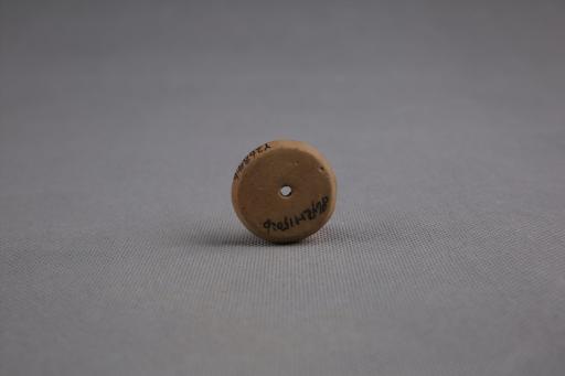 新石器时代屈家岭文化圆饼形中穿夹砂红褐陶纺轮