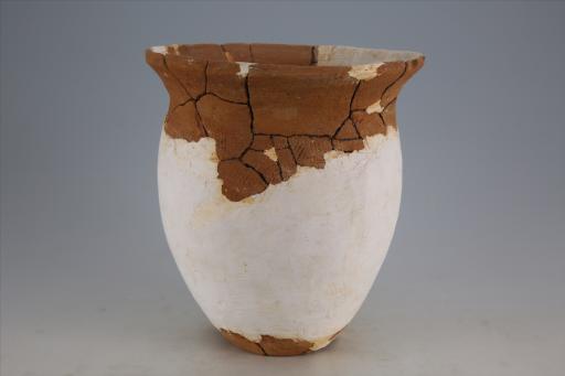 新石器时代石家河文化筒腹平底交错绳纹夹砂红褐陶罐