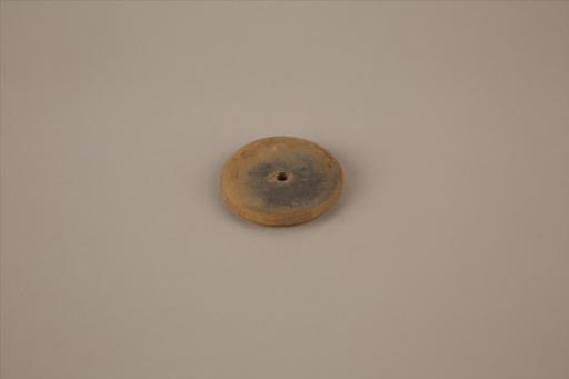 新石器时代屈家岭文化圆饼形中穿夹细砂黄褐陶纺轮
