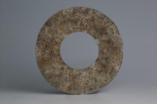 春秋时期四孔璧形锡饰片