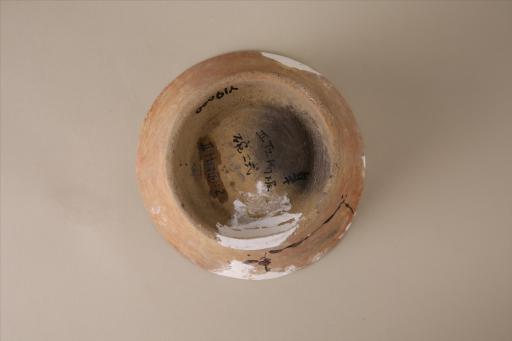 新石器时代大溪文化侈口斜弧壁圈足凸棱夹砂红褐陶碗