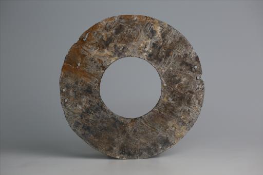 春秋时期四孔璧形锡饰片