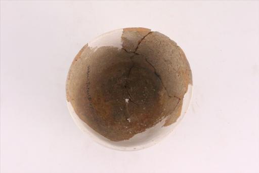 新石器时代城背溪文化弧腹平底绳纹褐陶钵