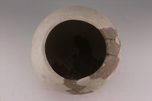 新石器时代屈家岭文化敛口鼓腹圜底夹砂红陶钵