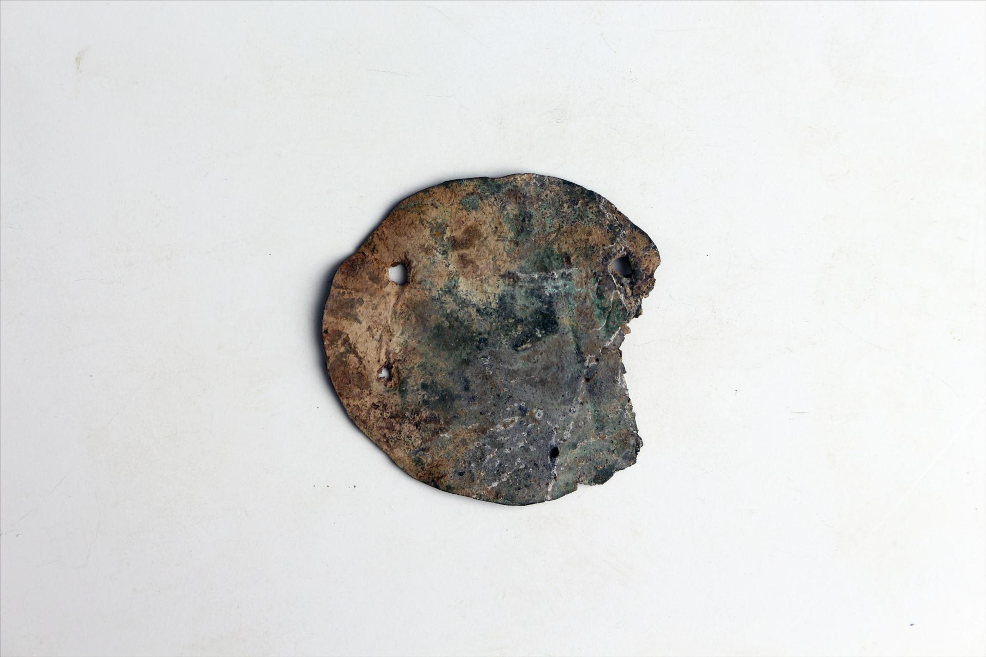 春秋时期圆形锡饰片
