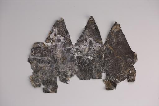 春秋时期兽形三尾锡饰片